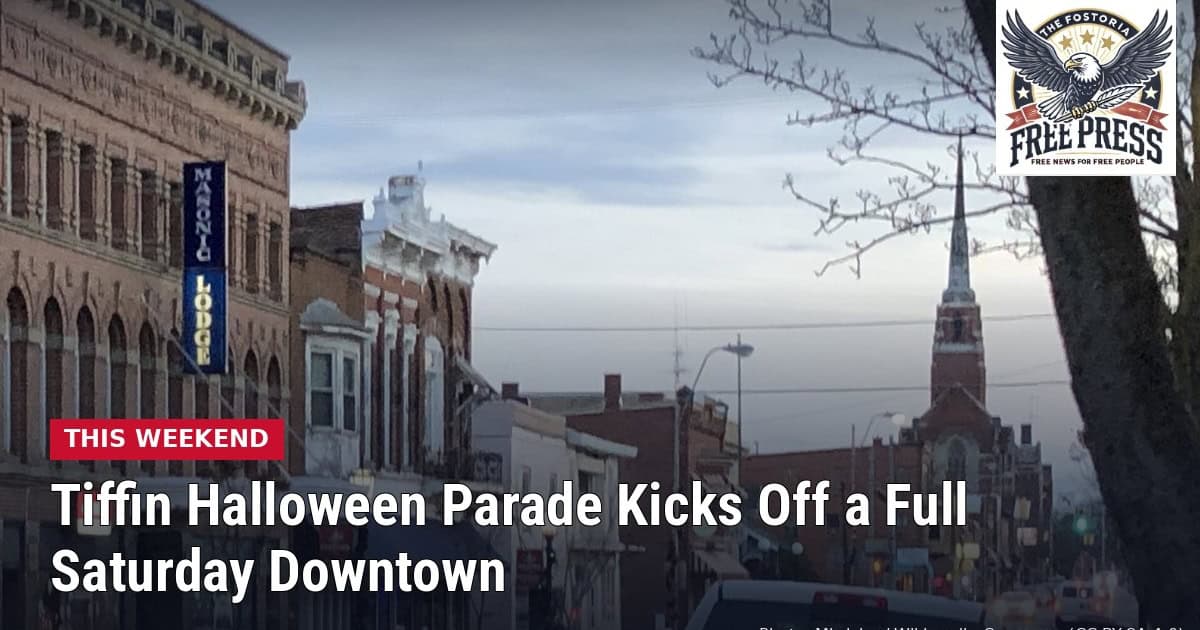 Storefronts along a street in downtown Tiffin, Ohio, with headline: Tiffin Halloween Parade Kicks Off a Full Saturday Downtown